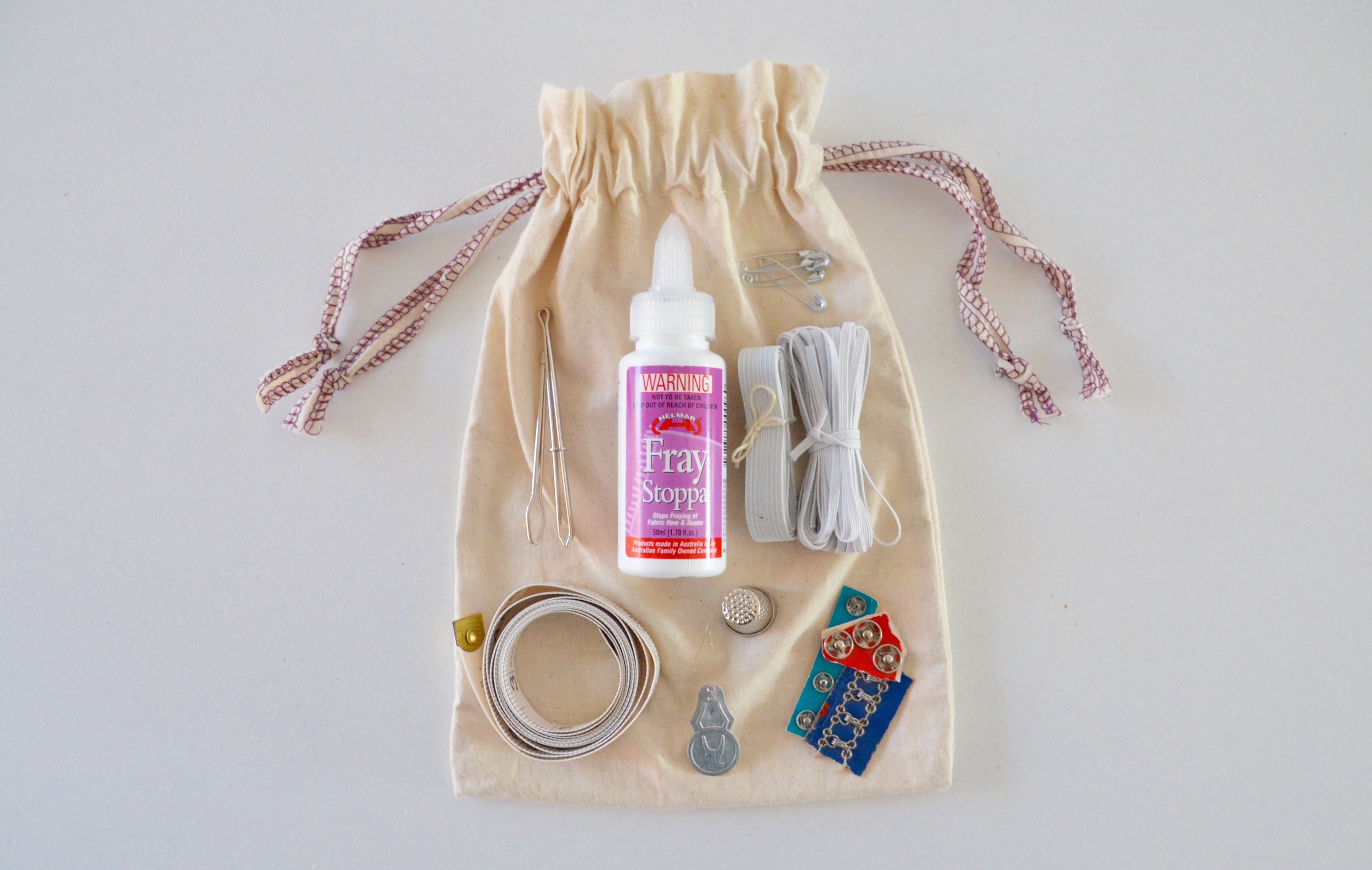 Assemble your own mending first kit for your clothes – small green